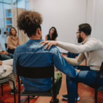 A group of people highlighting the importance of Peer connections to build a supportive community
